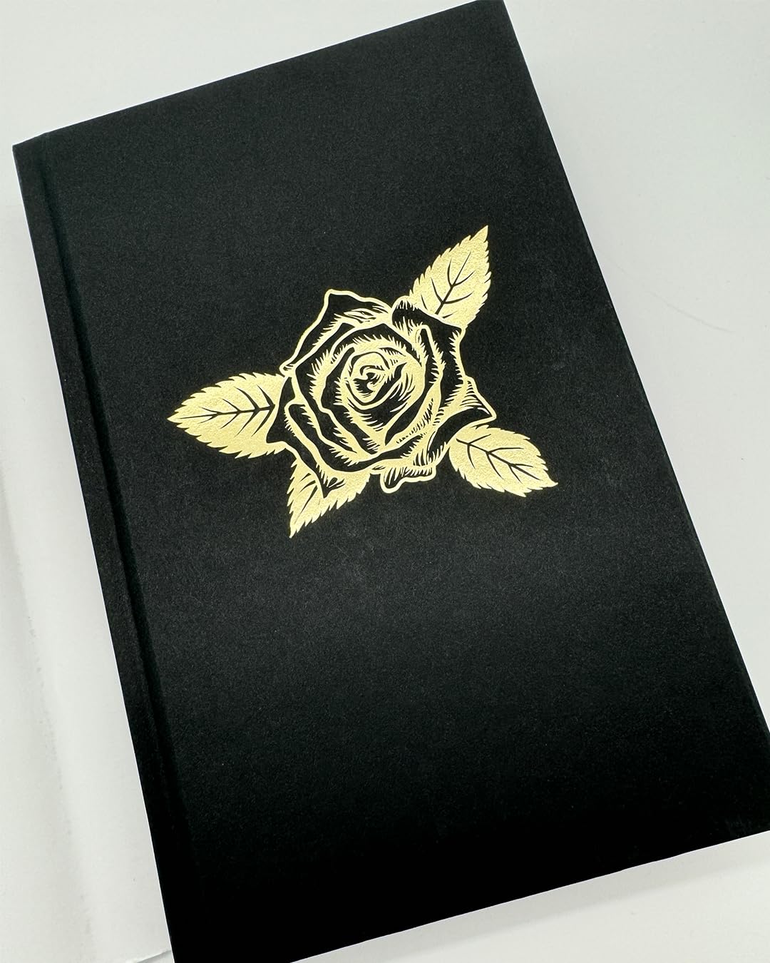 Never the Roses (Deluxe Edition)